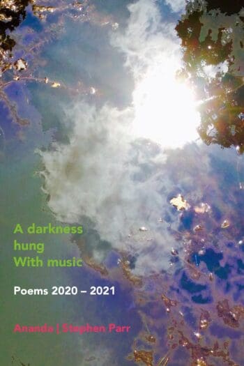A darkness hung with music